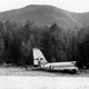 The tail section of Braniff 707 N7071 sits beside the Stillaguamish River. (Ron Palmer, Heraldnet)